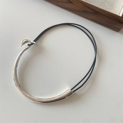 Minimalist silver necklace with leather cord