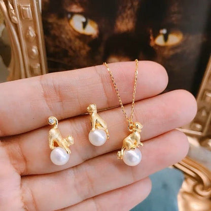 Leuke asymmetrische kattenoorbellen en ketting