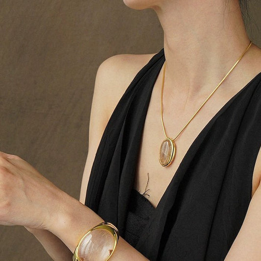 Gedurfde minimalistische gouden rutielkwarts ovale hanger ketting