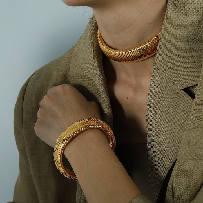 Dikke stretch designarmband en choker