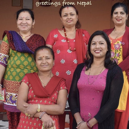 Luna-Leena haarclips zonnebloem 2x - geel - biologisch katoen - handgehaakt in Nepal