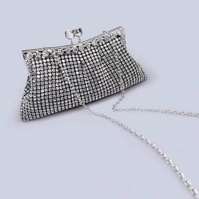 Luxury clutch with diamond look, gold and silver