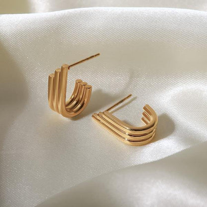 Minimalist U-shape gold stud earrings