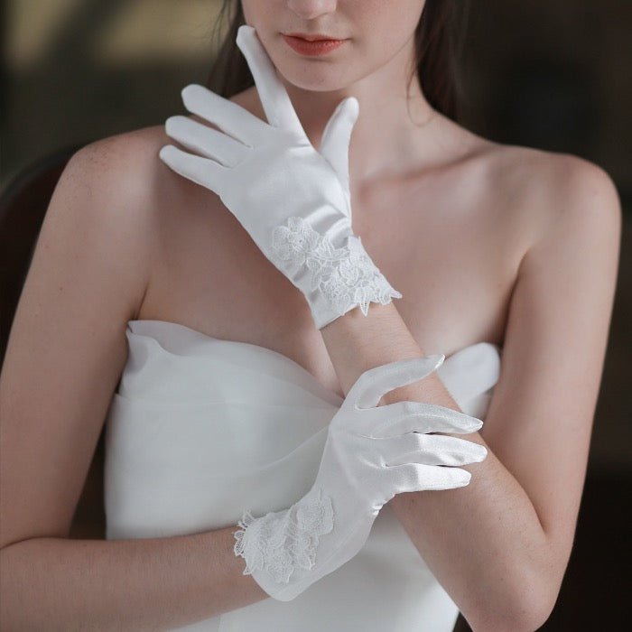 Satin white bridal gloves with lace flowers