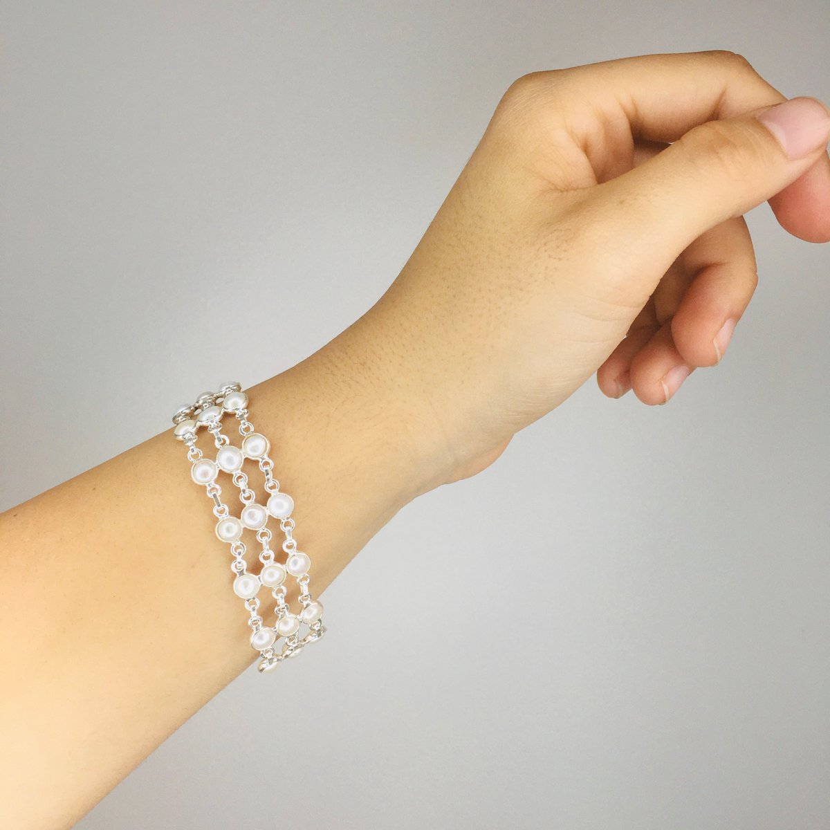 "Puur en elegantie" armband in parels en 925 zilver