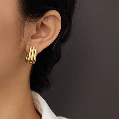 Minimalist U-shape gold stud earrings