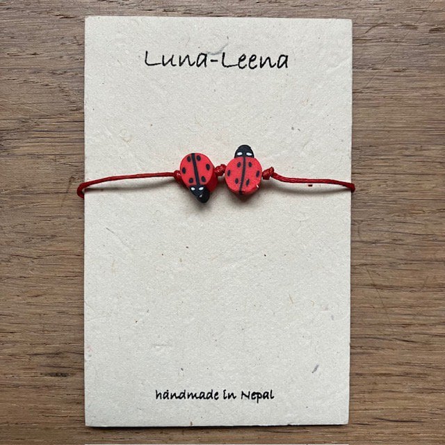 Luna-Leena kinderarmband lieveheersbeestje rood - handgemaakt in Nepal