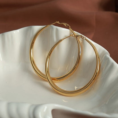 Chic gold earrings - New moon shape