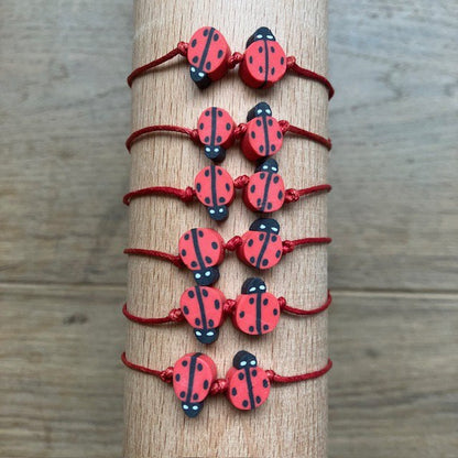 Luna-Leena kinderarmband lieveheersbeestje rood - handgemaakt in Nepal