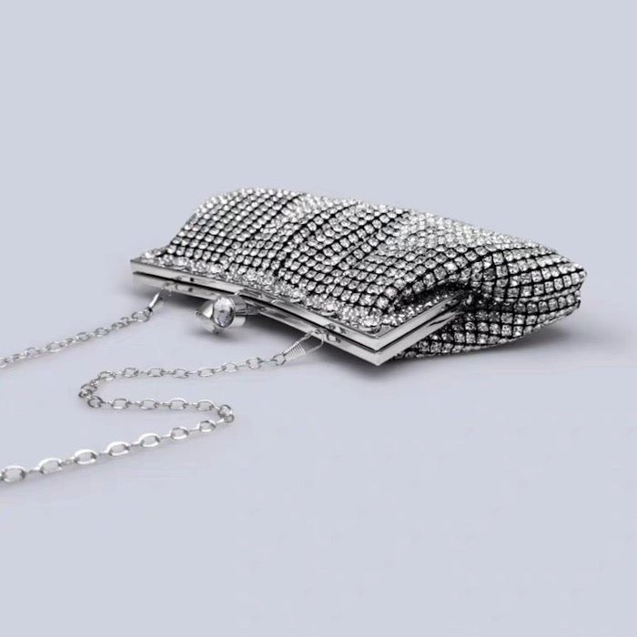 Luxury clutch with diamond look, gold and silver