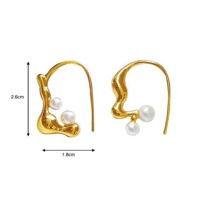 Asymmetrical flowing line pearl earrings