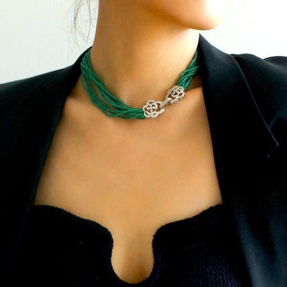 Gevlochten choker met kattenoogstenen - Camille-sluiting